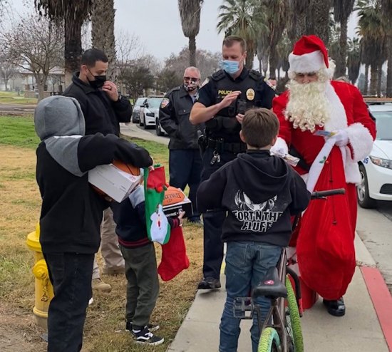 The Lemoore Police Department and a Volunteers in Policing contingent, along with Lemoore Christian Aid, undertook their annual "Presents on Patrol" on Dec. 22.